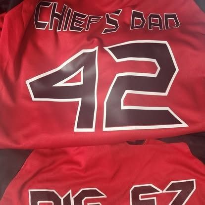 A red shirt with the number 42 on it