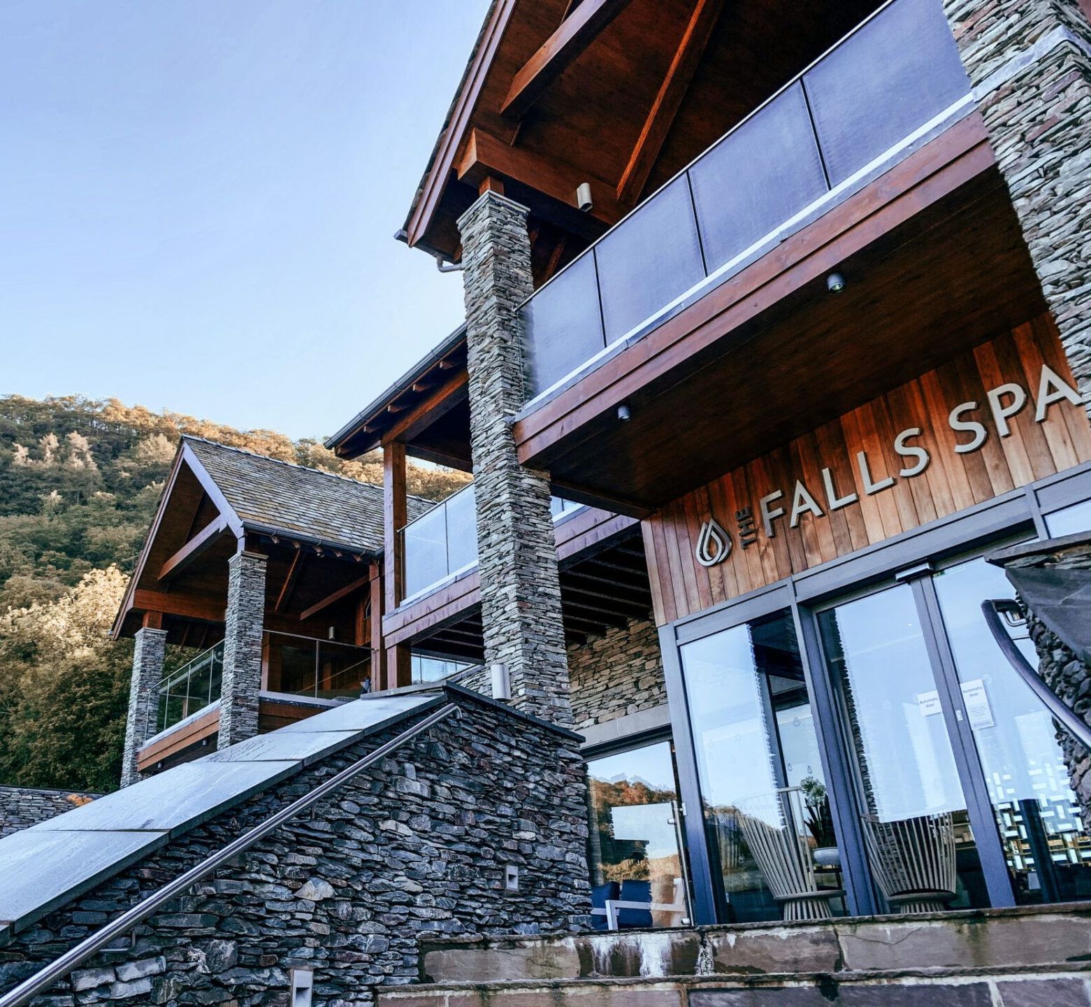 A large building with a sign that says falls spa