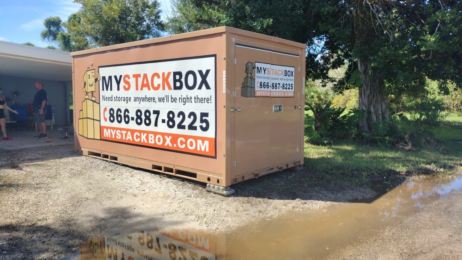 My Stack Box storage unit pod outside flooded florida home