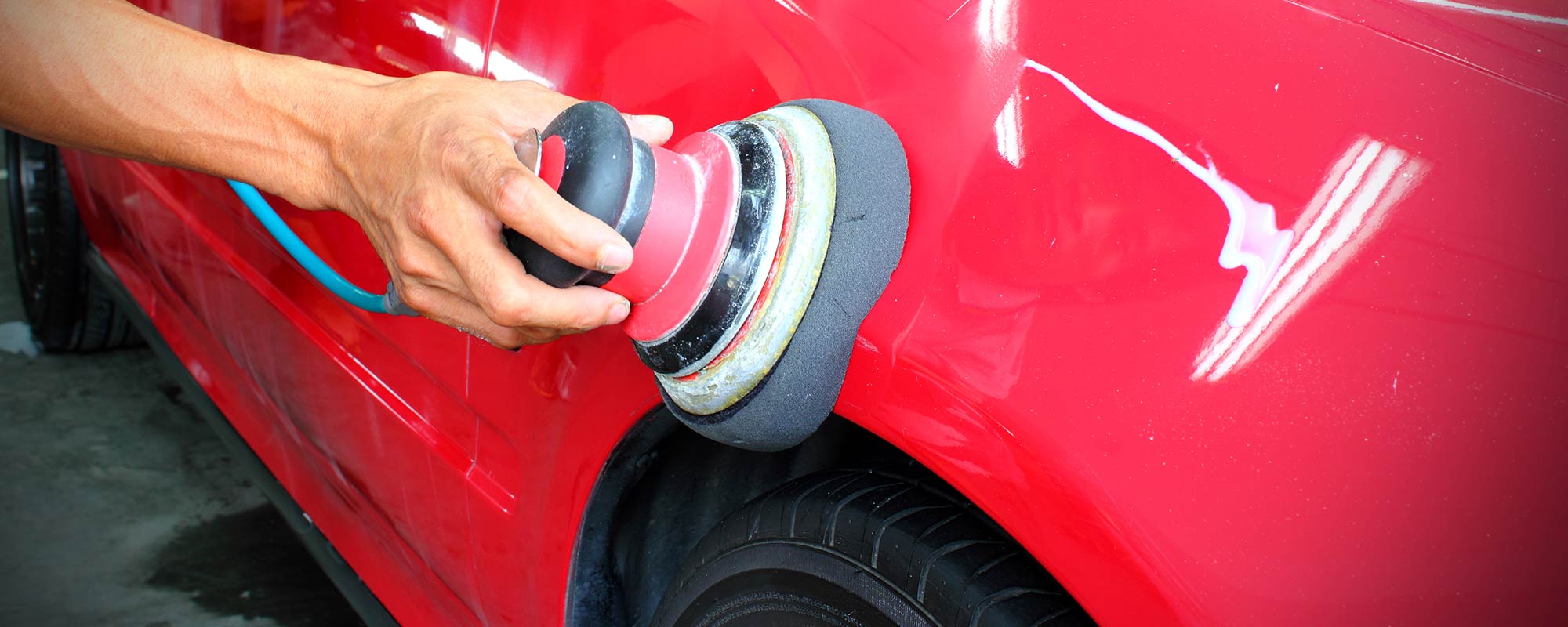 Automobile being polished by Tranz Brite Limited