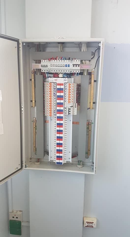 Open Electrical Panel on a Wall With Various Wires and Terminals — Ionspark Electrical in Biboohra, QLD