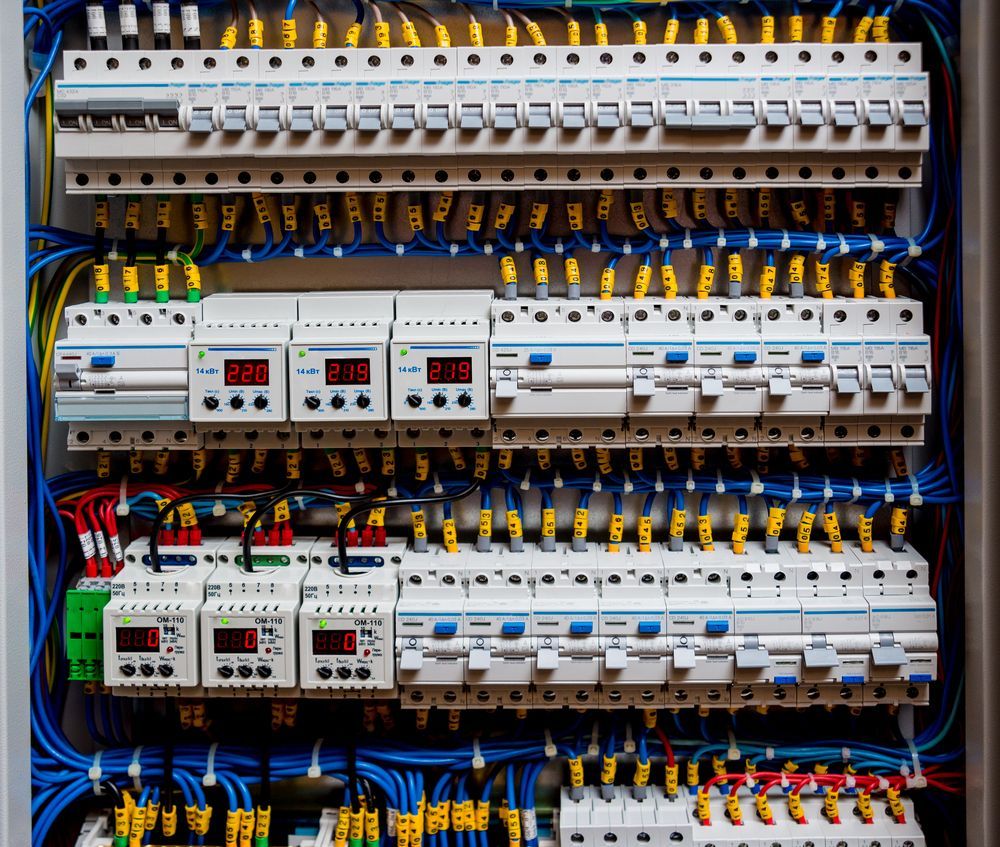 Electrical Panel With Circuit Breakers, Wires, and Digital Displays — Ionspark Electrical in Atherton, QLD
