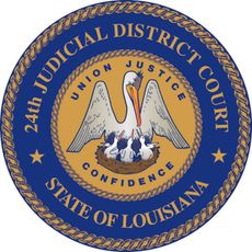 Official seal of the 24th Judicial District Court of Louisiana, featuring a pelican in a nest on a gold and blue background.