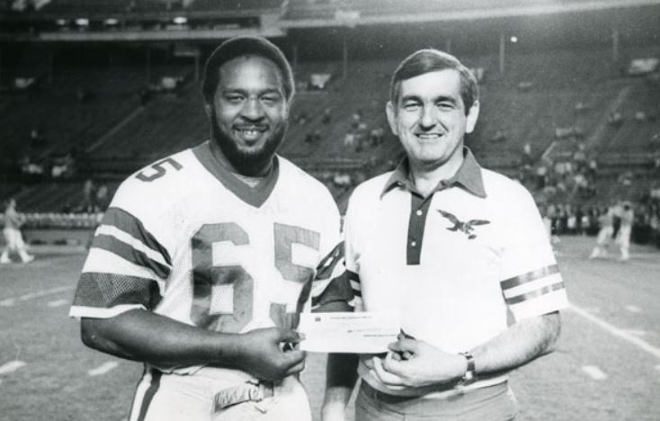 A football player with the number 69 on his jersey