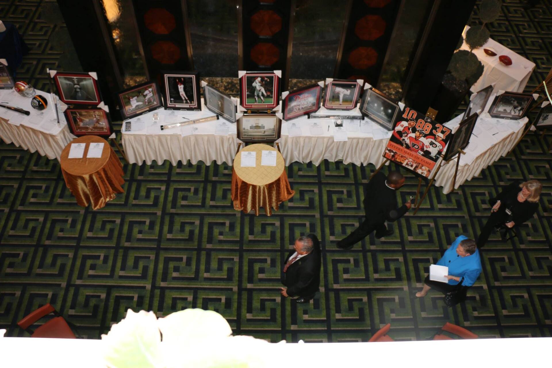 An aerial view of a room with tables and chairs