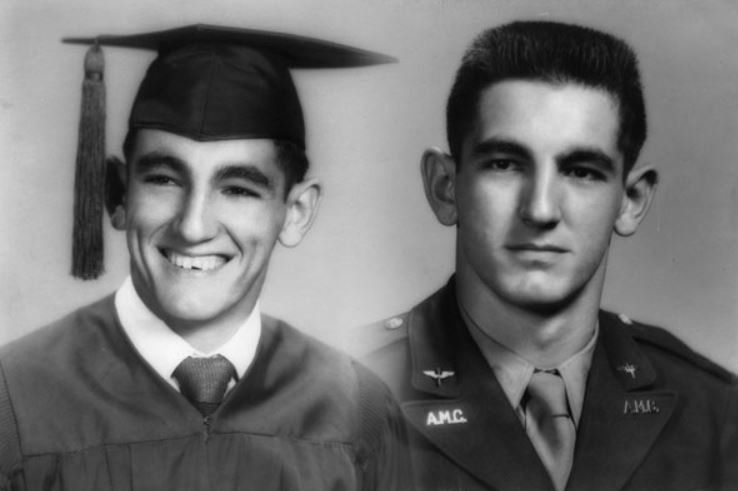 A man in a graduation cap and gown next to a man in an army uniform