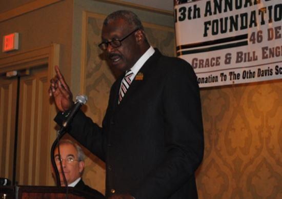 A man is giving a speech at the 13th annual foundation