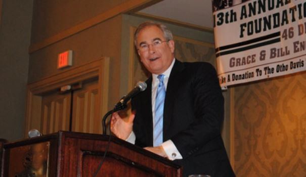A man is giving a speech at the 13th annual foundation