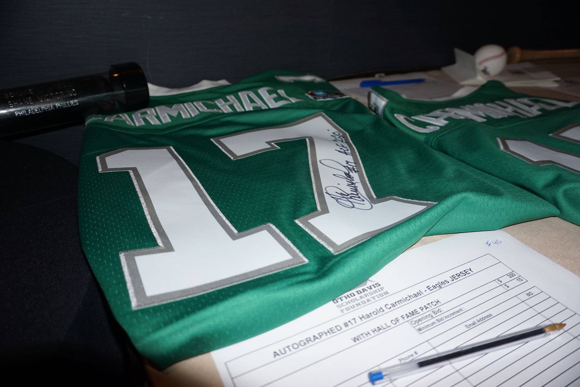 A green jersey with the number 17 on it