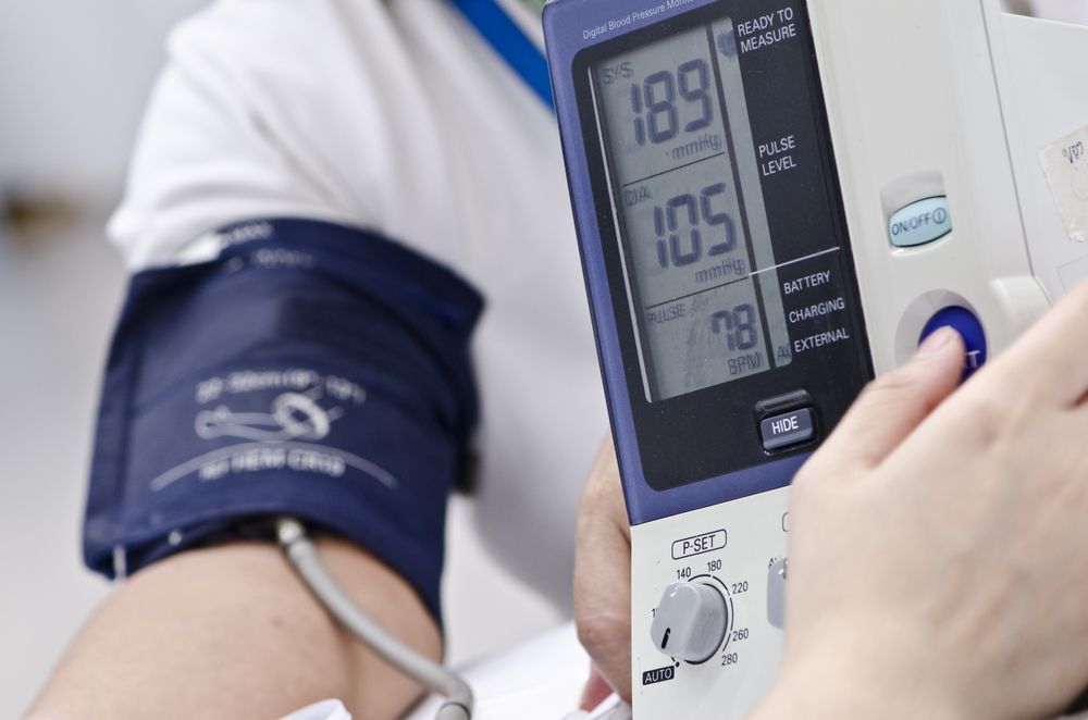 A Person's Blood Pressure Is Being Tested — Mall Medical Centre In Alice Springs, NT