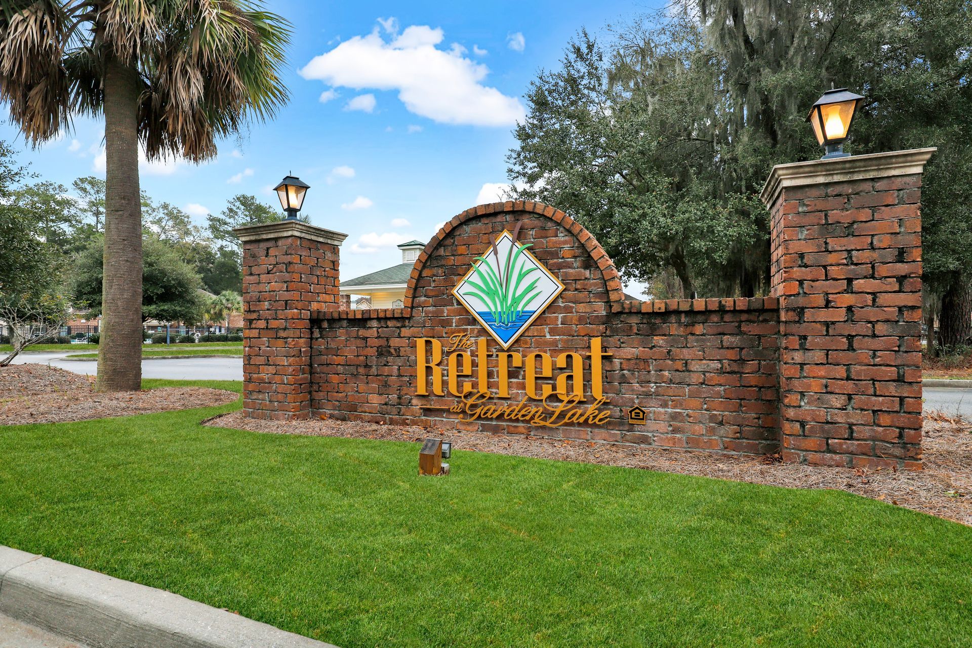 A brick sign with the word retreat on it