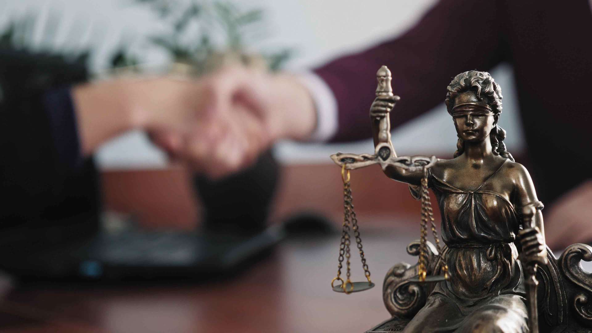 Statuette Of Lady Justice On The Table — Southgate, MI — Colovos Law Firm