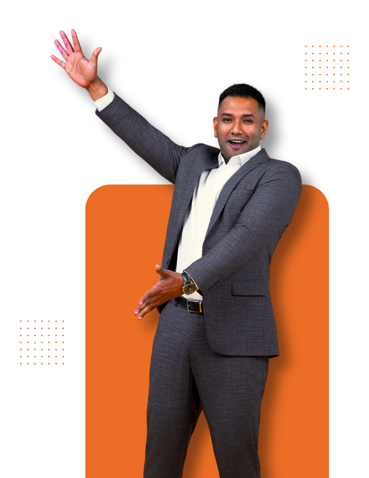 A man in a suit is waving his hand in the air.