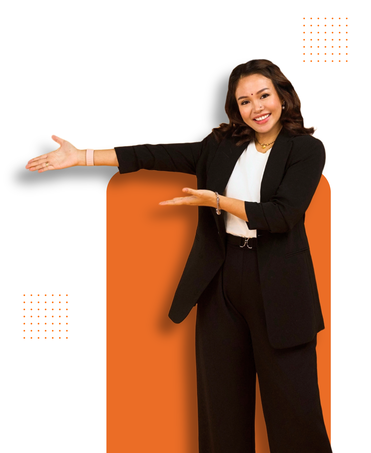 A woman in a suit is standing in front of an orange sign.
