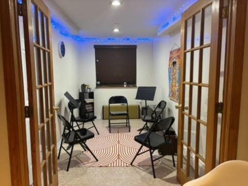 A room with a lot of chairs in it