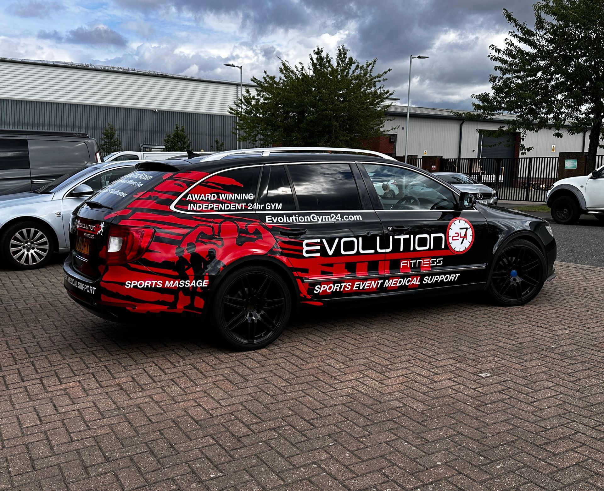 Black and red station wagon with 