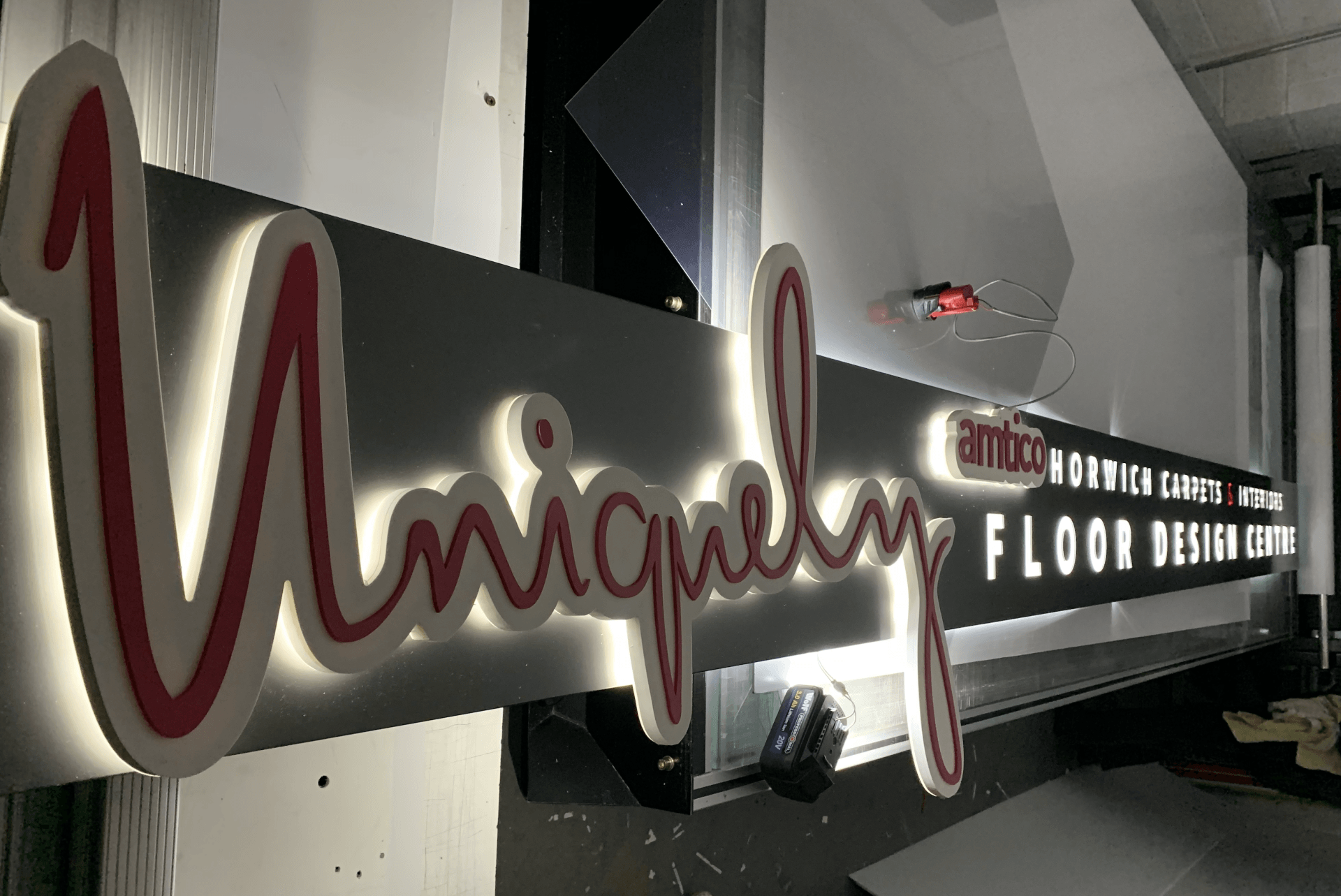 Fret cut tray sign with CNC cut, built up logo, halo lit with micro LEDs