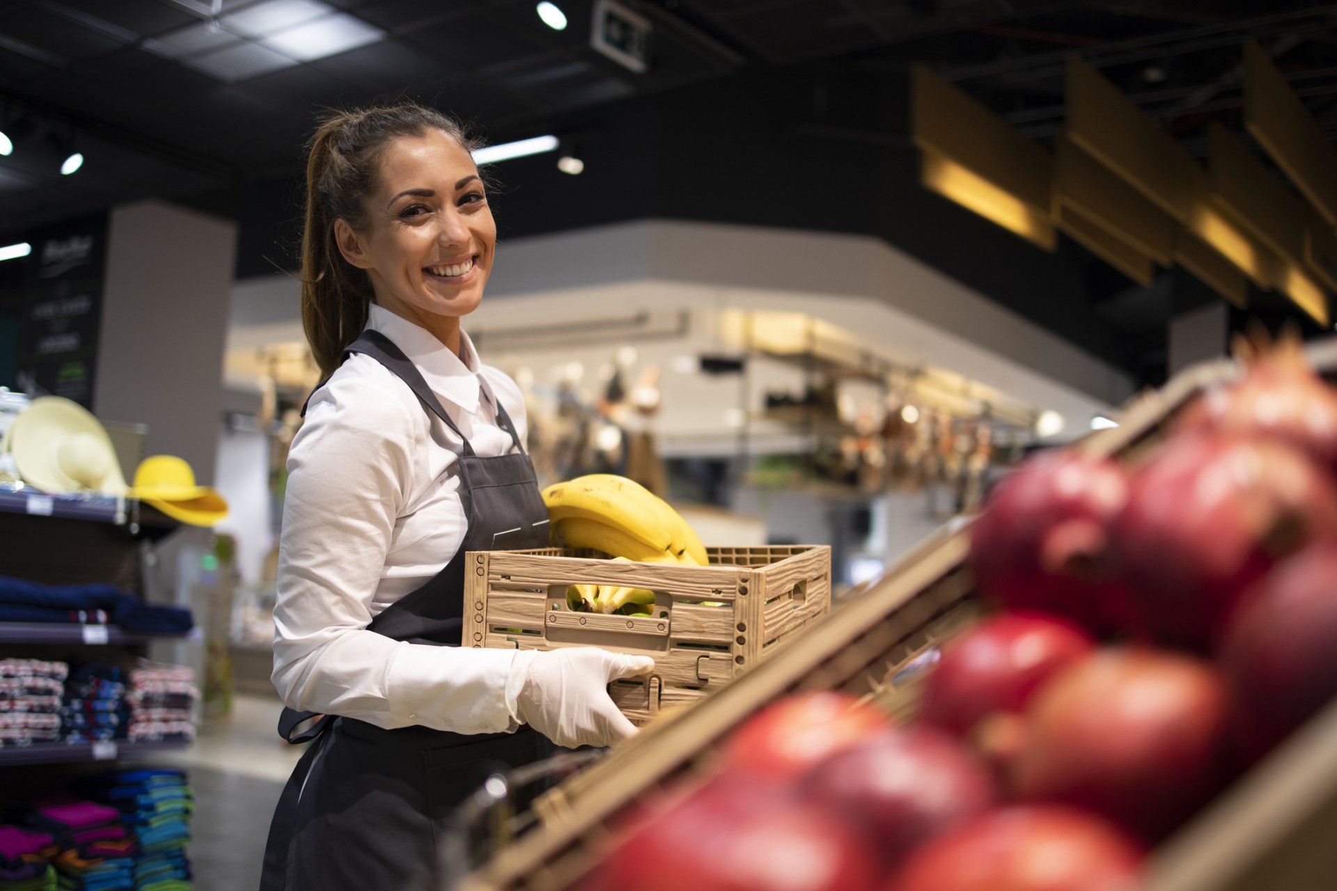 Woman Working in Grocery Store — Saginaw, MI — APS Employment Services, Inc