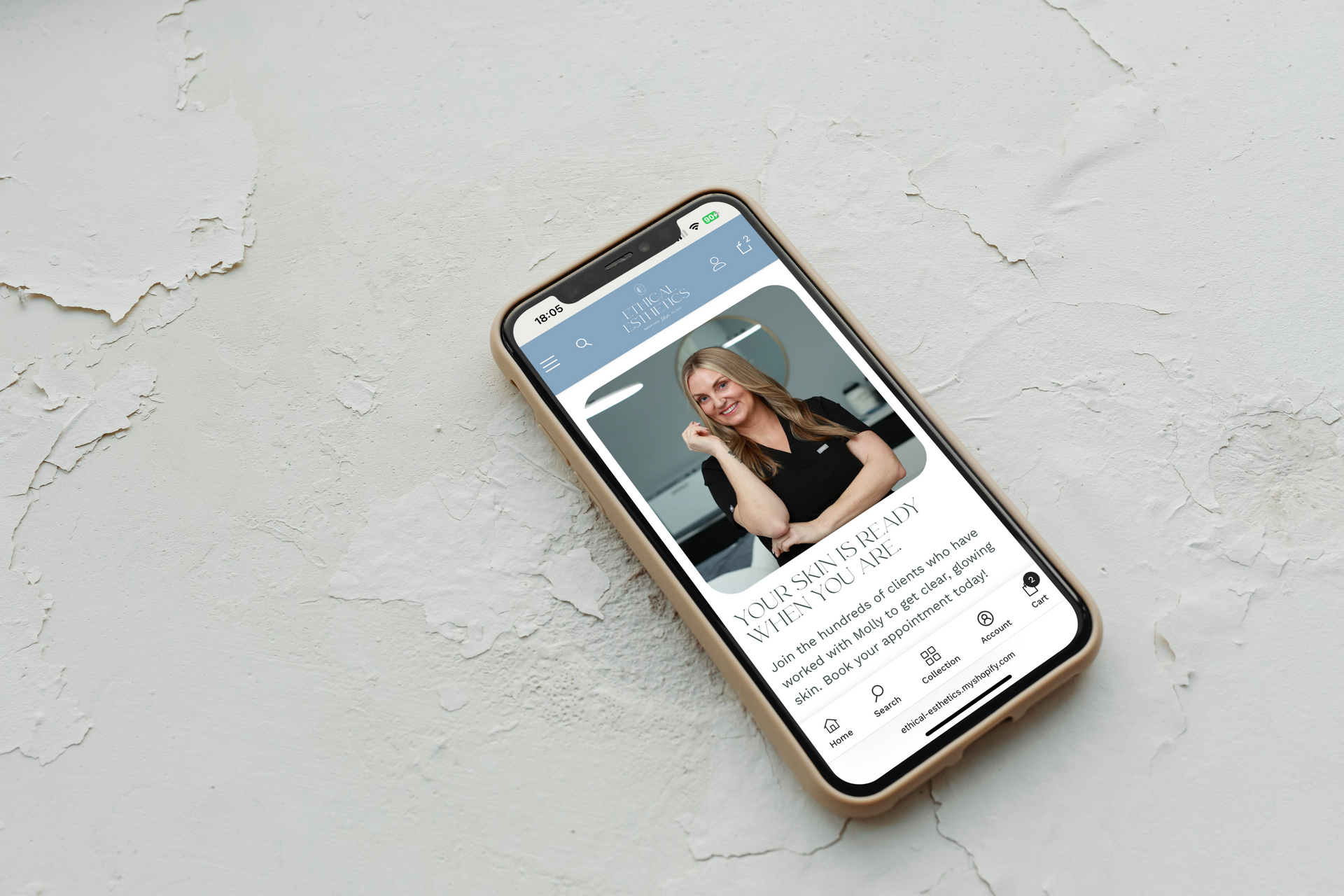 Smartphone on a light gray surface showing a social media post with a woman speaking on screen
