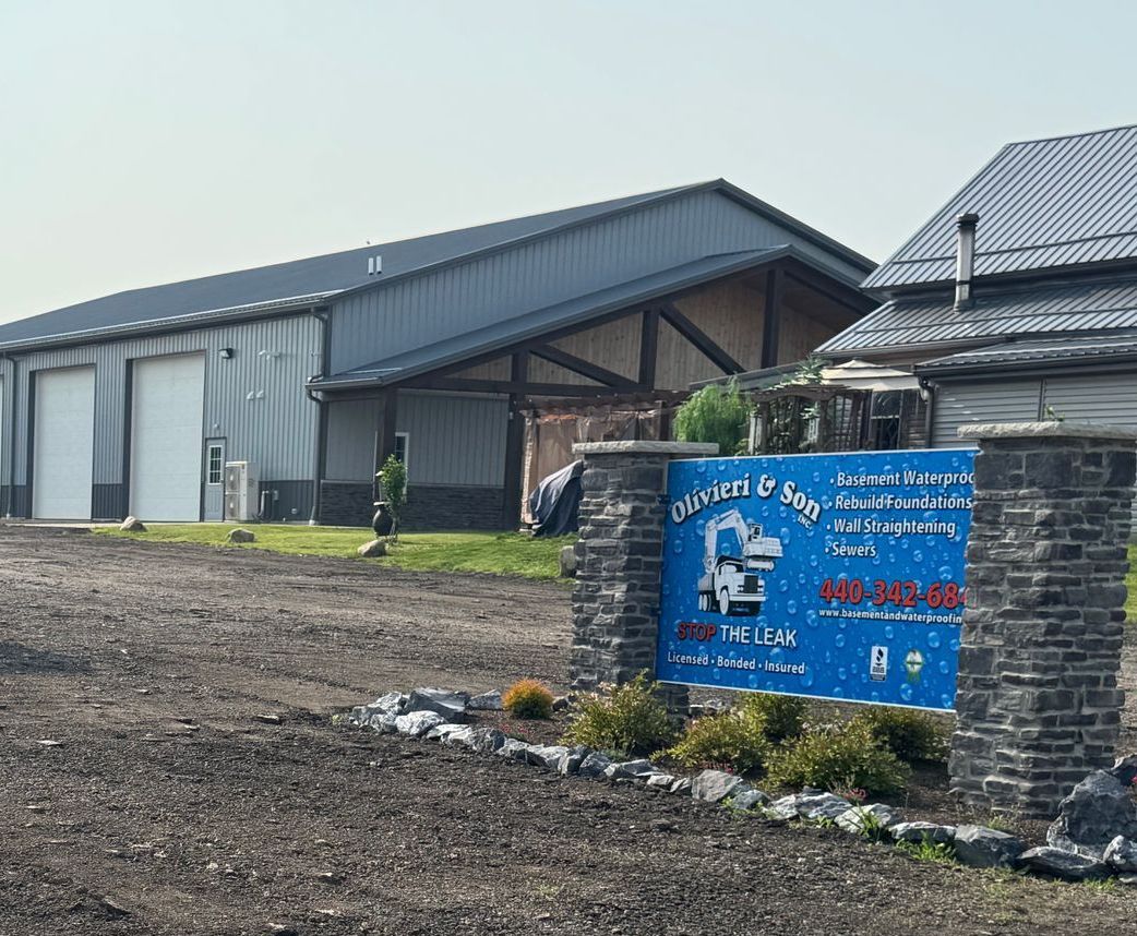 Outside of Olivieri & Son building with their sign
