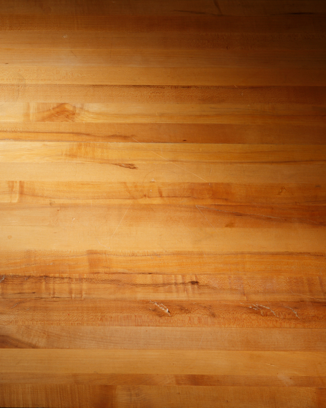 A close up shot of a butcher block countertop