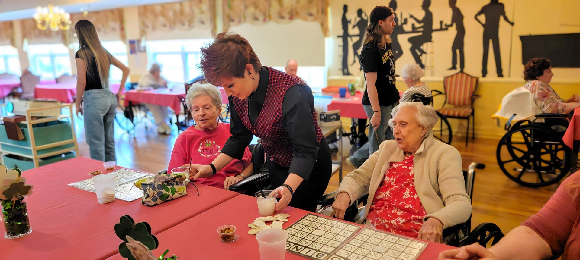 Residents participating in a table activity at Newburgh Health and Rehab