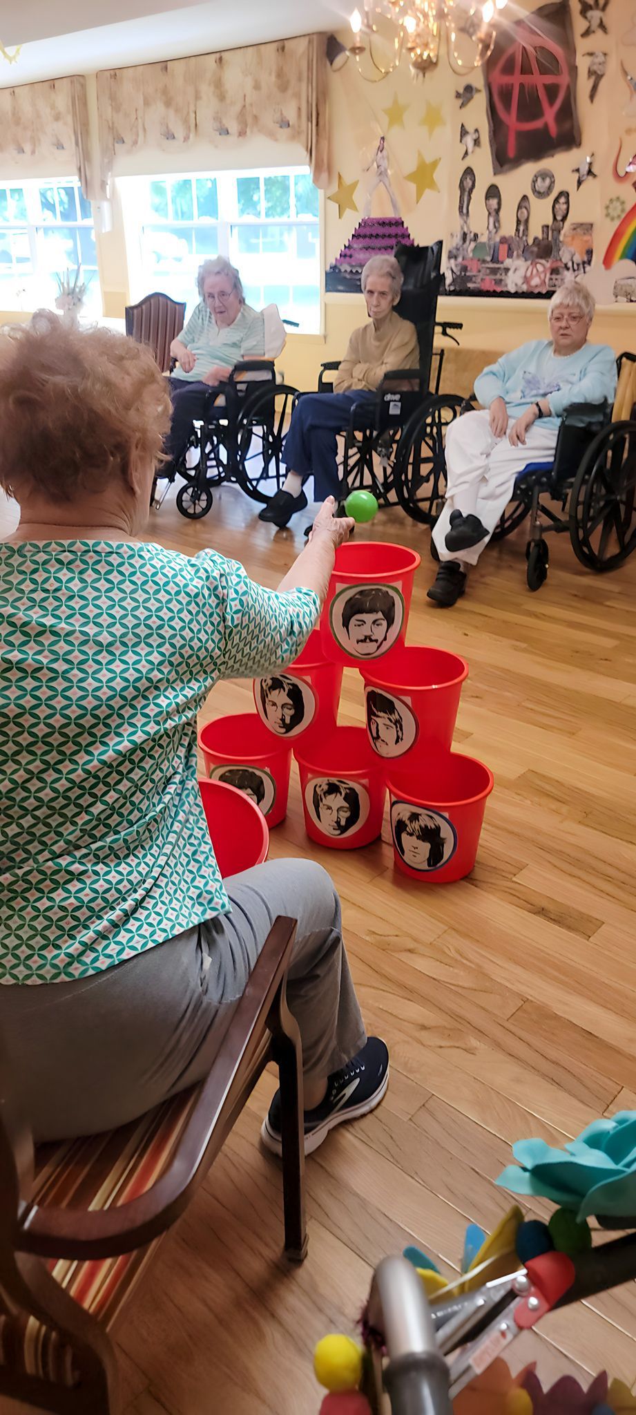 Residents spending time together in a common room at Newburgh Health and Rehab