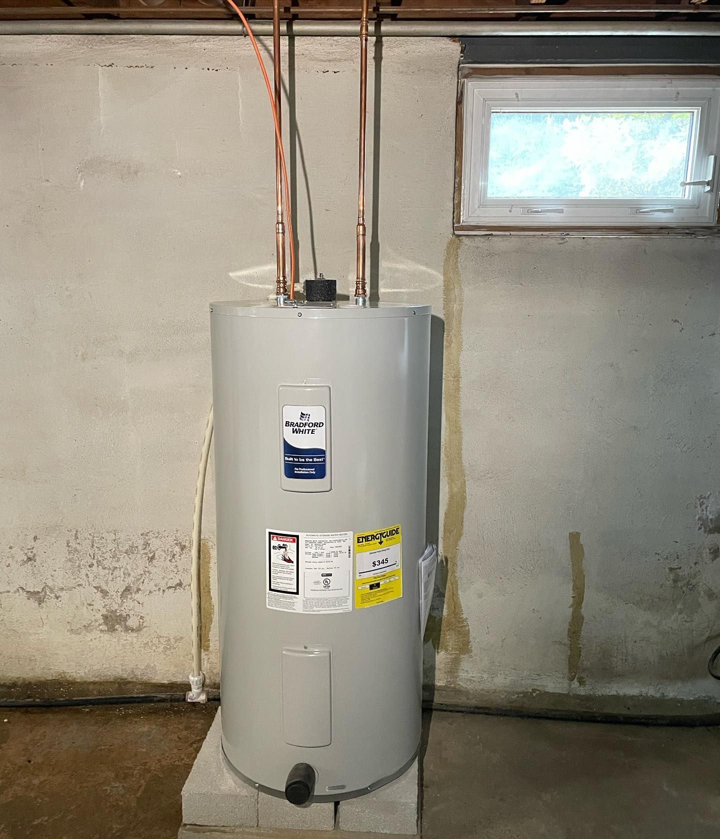 a water heater with a checkpoint sticker on it