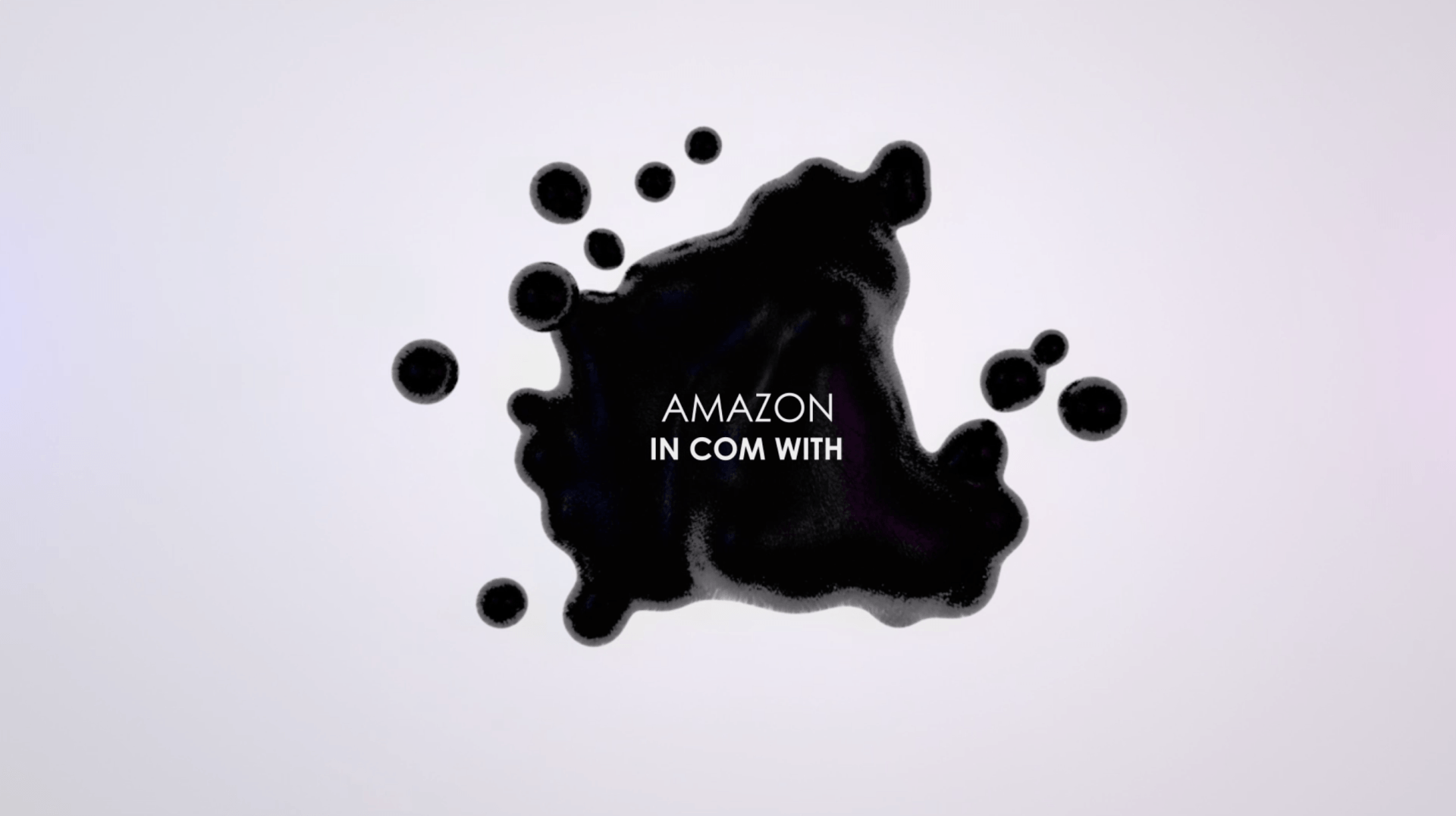 Una mancha de tinta negra con las palabras 