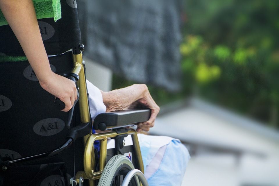 An Old Man on a Wheel Chair - Northfield, VT - Hundred Acre Consulting, LLC