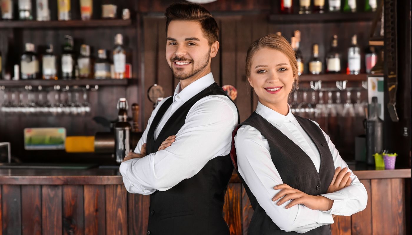 Young servers of a bar and pub franchise