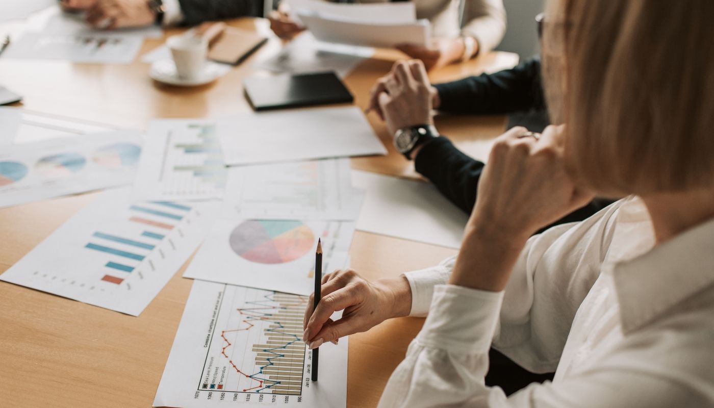 Team meeting discussing their business exit plan