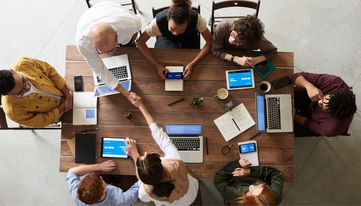 Company owner with business consultant planning an exit strategy for entrepreneurs