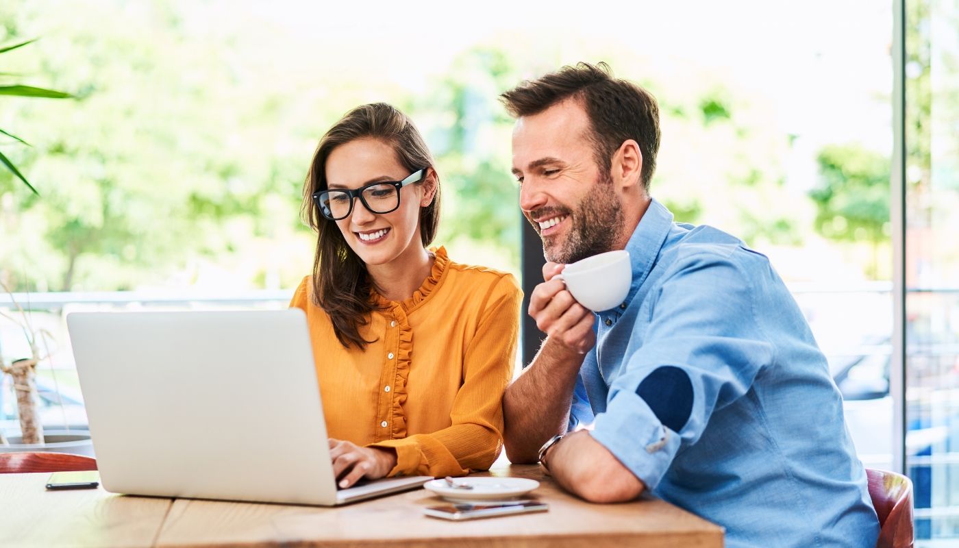 Woman and man learning how to become franchise owners