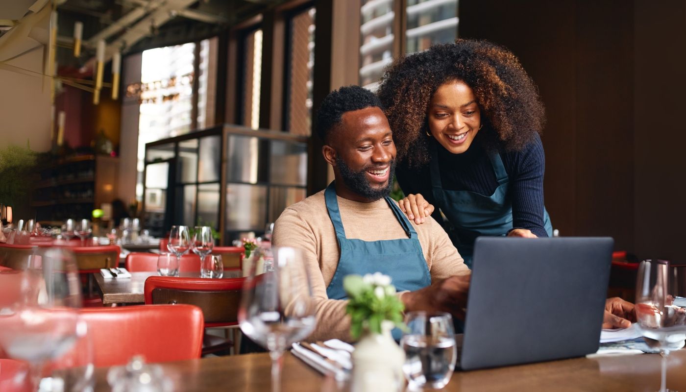 Small business owners starting a business franchise