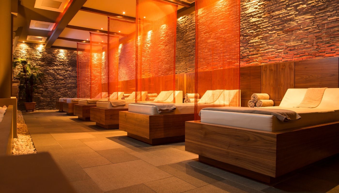 Modern spa interior with calming lighting, highlighting wellness franchise opportunities.