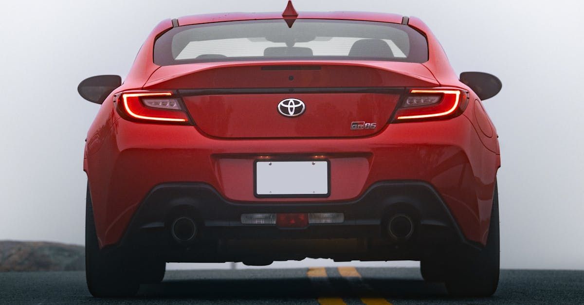 A red toyota sports car is parked on the side of a road. | Interstate Auto Care