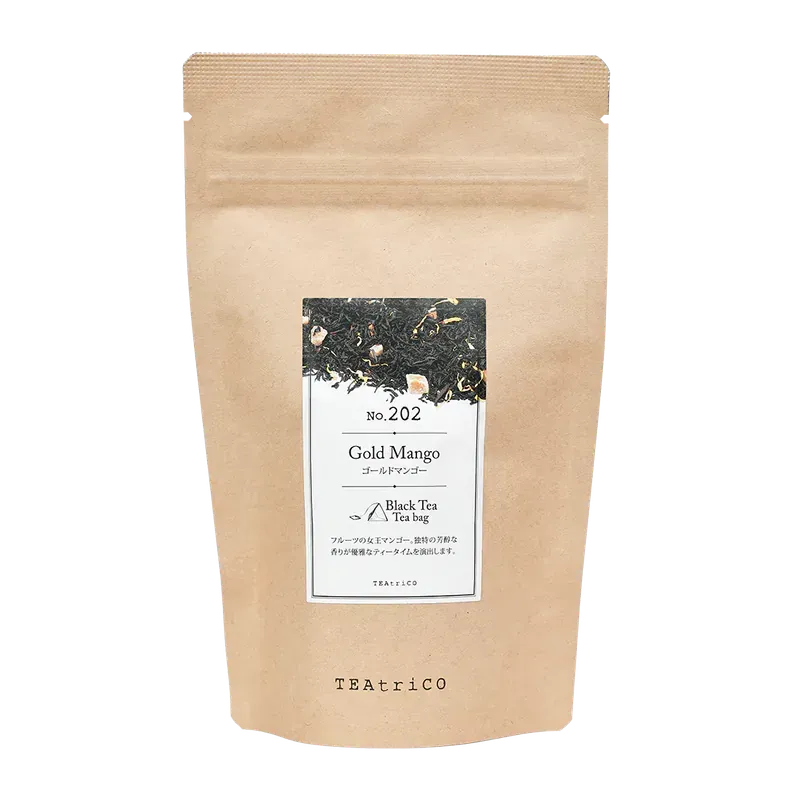 棕色茶包，標籤上寫著「金芒果」紅茶。