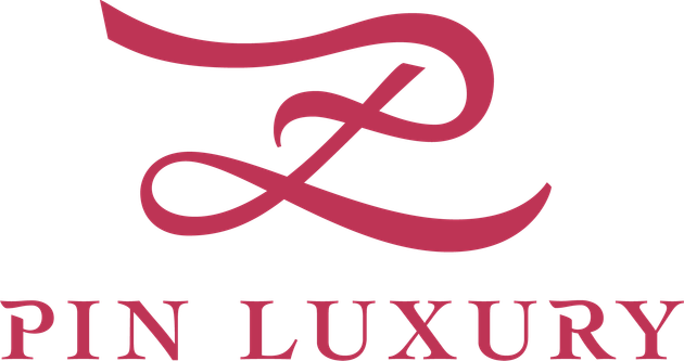 酒紅色風格化的「Z」字母組合圖案，上方為「PIN LUXURY」字樣。