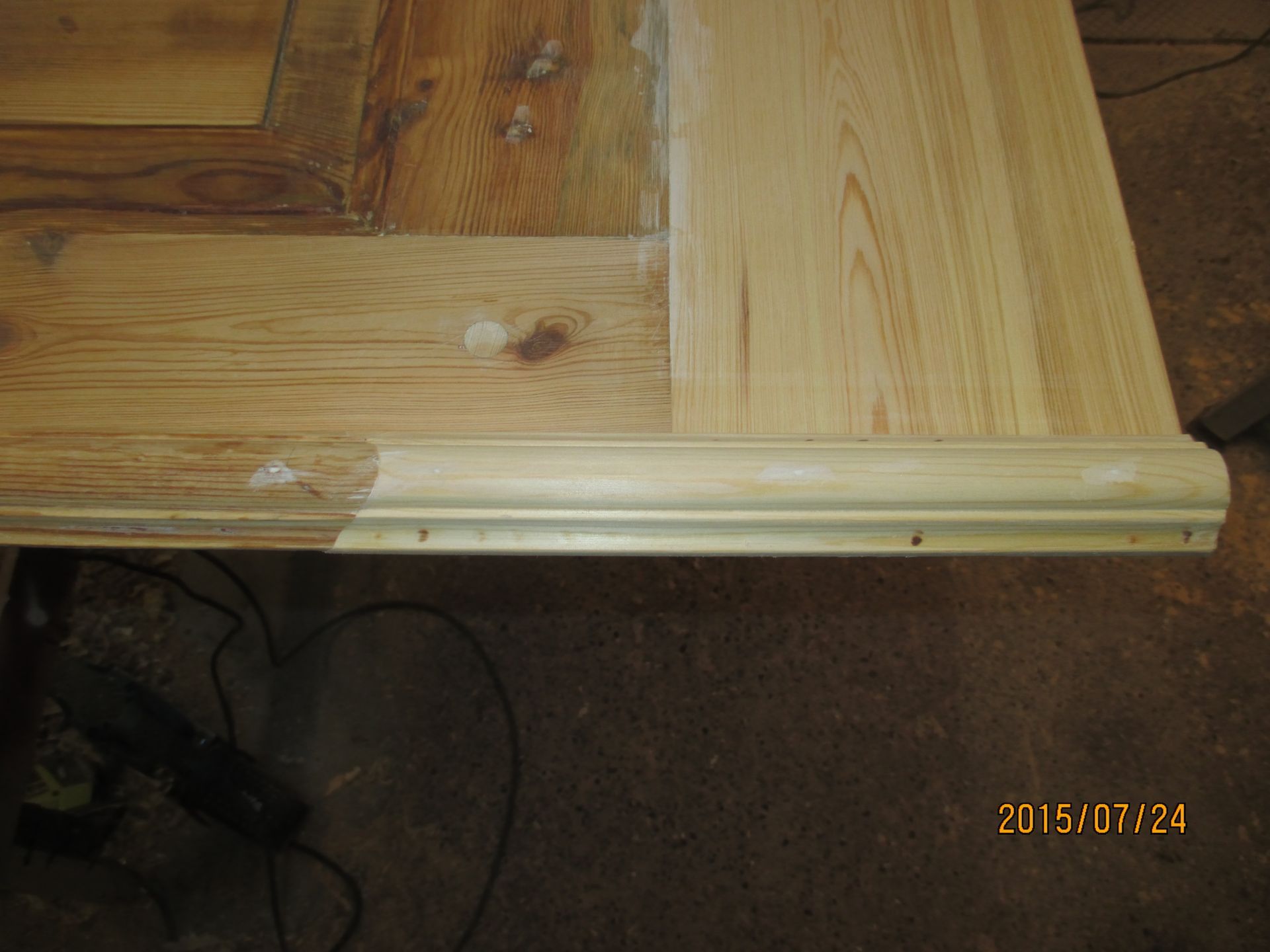 A piece of wood is sitting on top of a table.