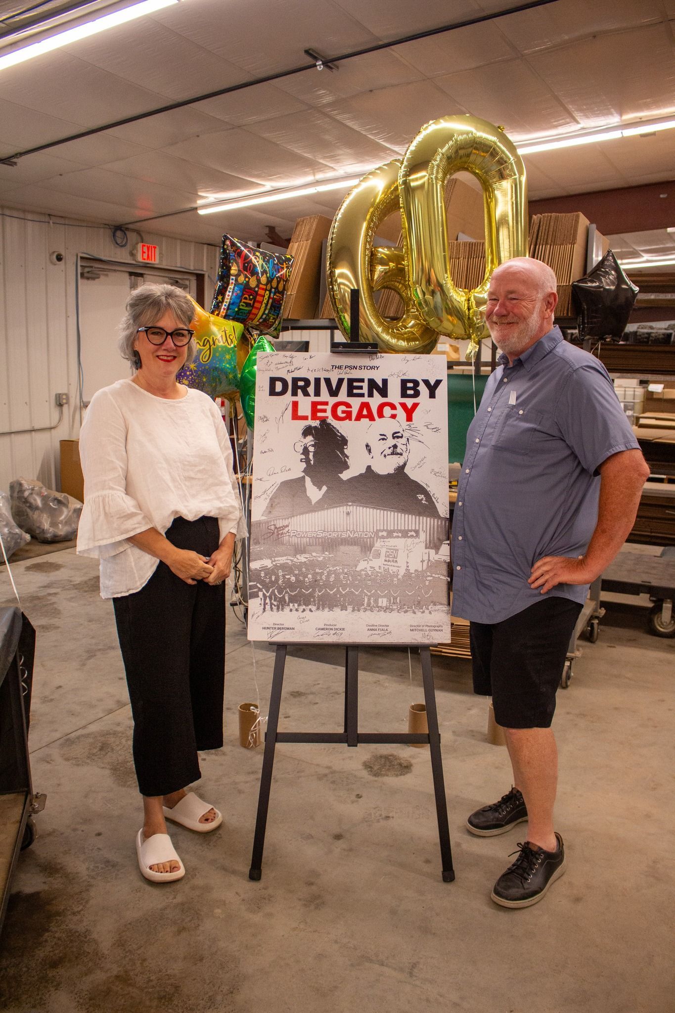 Yellow and black ASV Posi-Track RT120F compact track loader. Sold for $92,600 at Highmark Auctions.