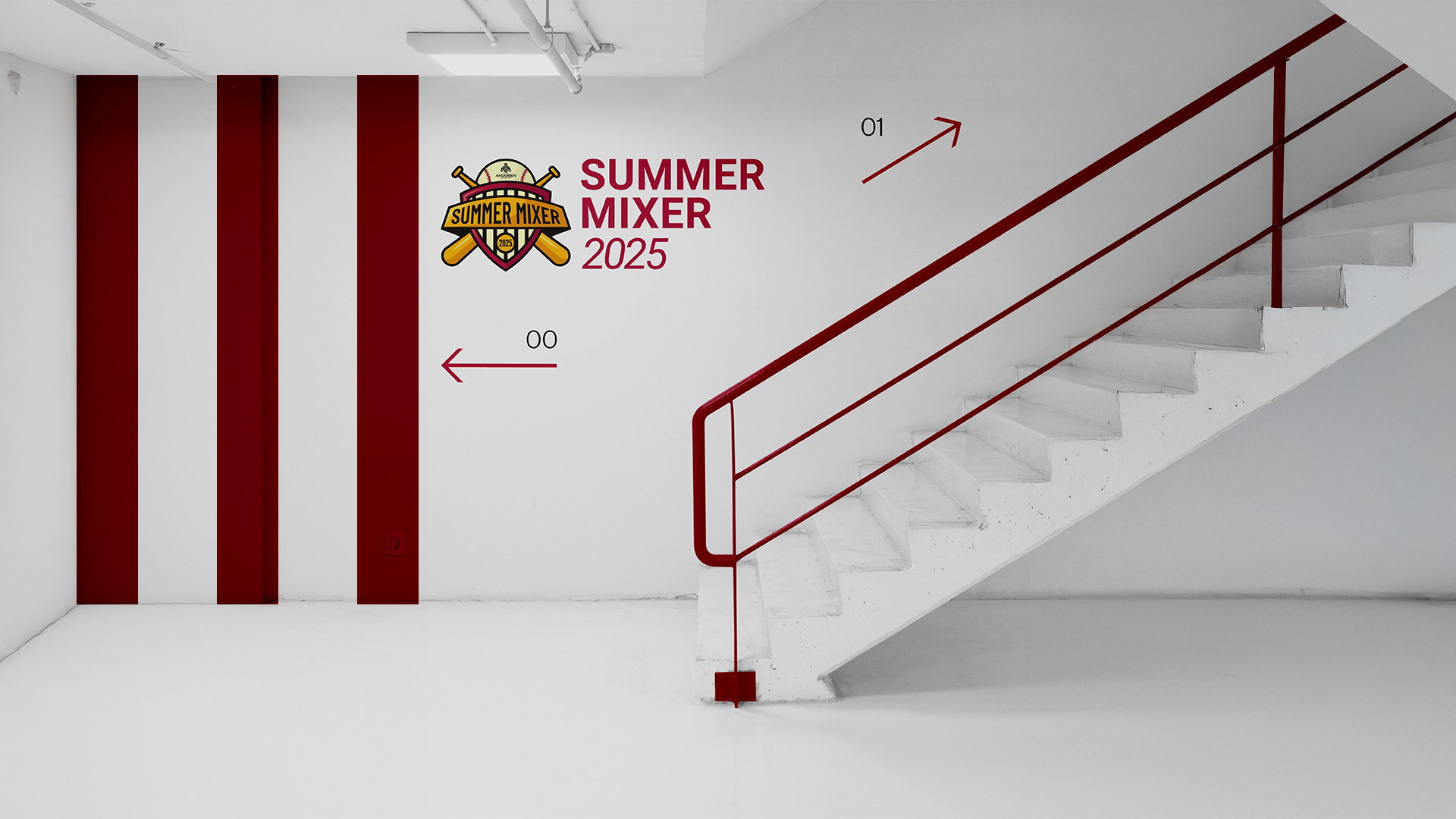 Stairwell with red handrails and vertical striped wall, signage for