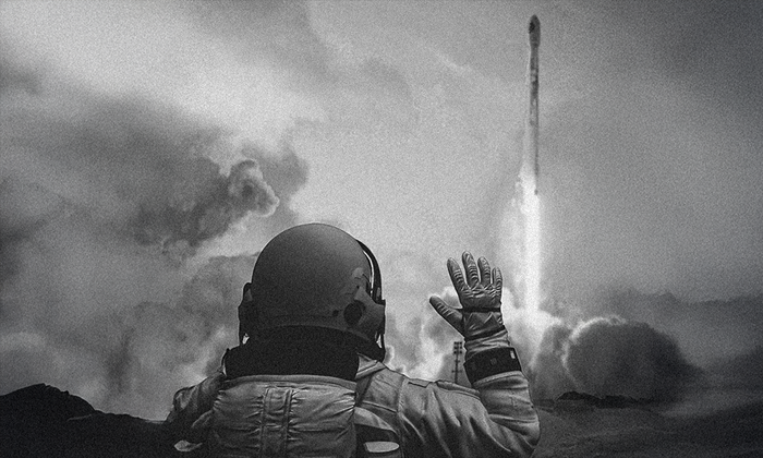 Astronaut in a helmet waves at a rocket launching, amidst gray clouds and smoke.