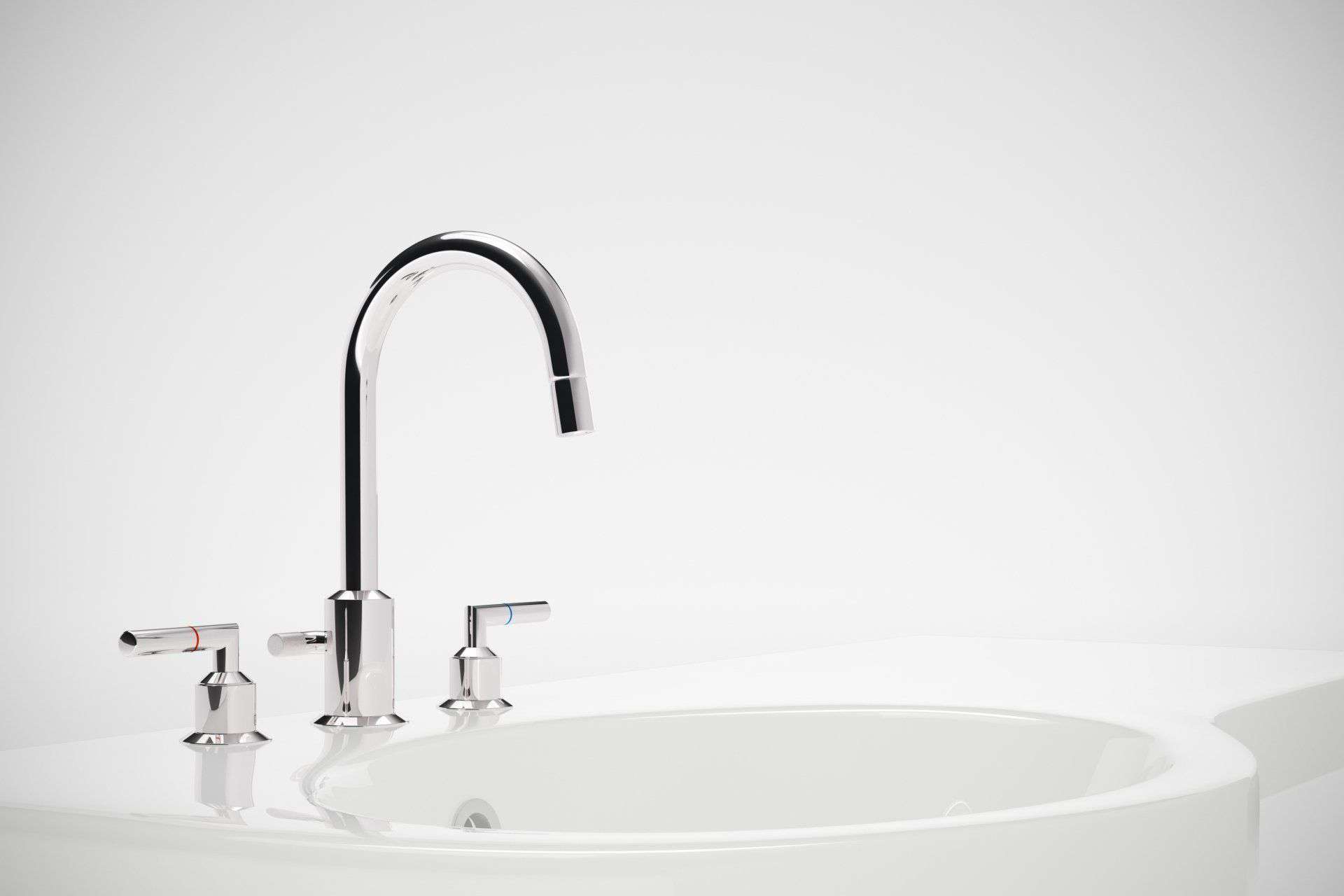 A bathroom sink with a chrome faucet on a white background.
