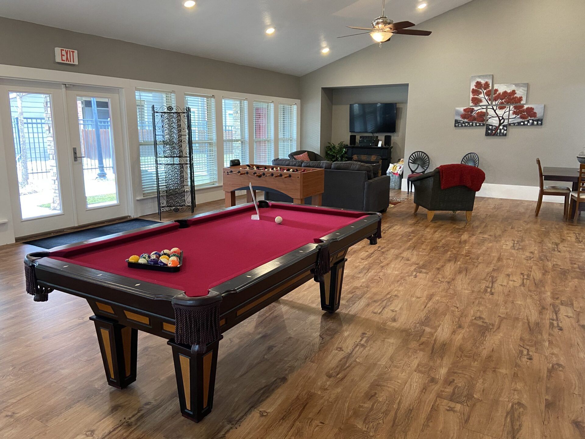 Interior of community room with pool table