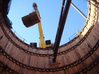 Loaded Buckets Being Hoisted — Las Vegas, NV — Hofsommer Excavating Inc.