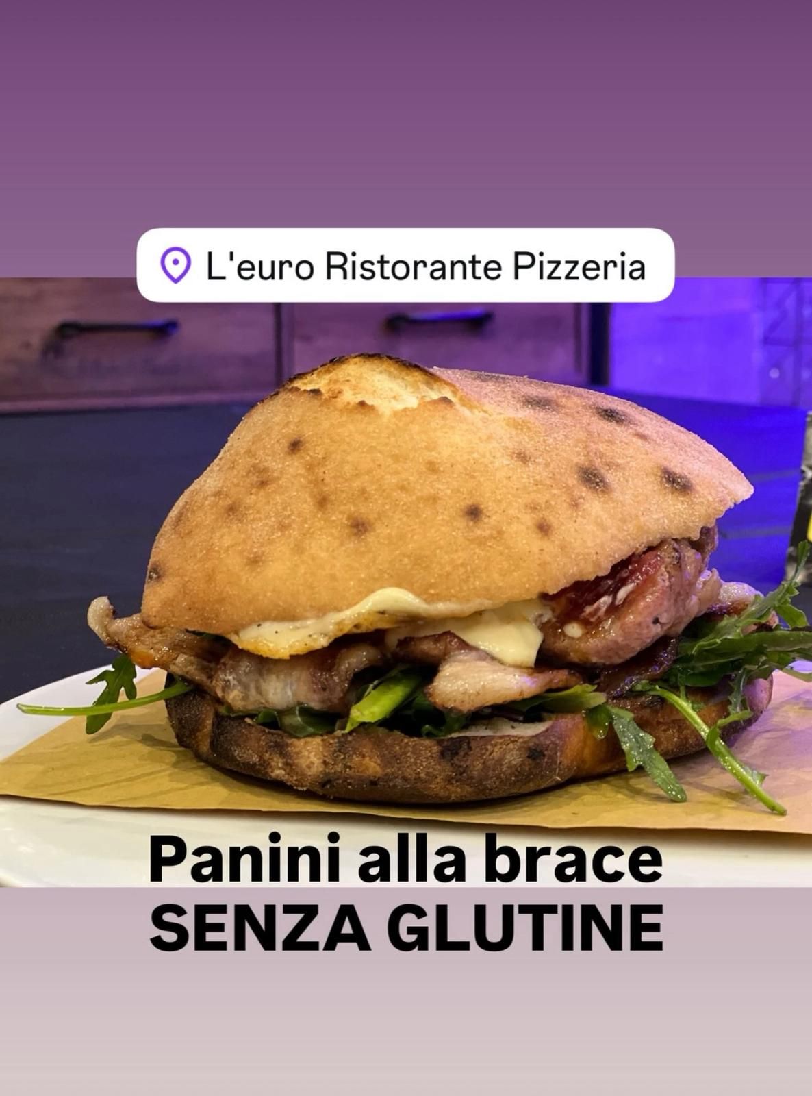 Panino grigliato senza glutine con carne e rucola, presso L'euro Ristorante Pizzeria.