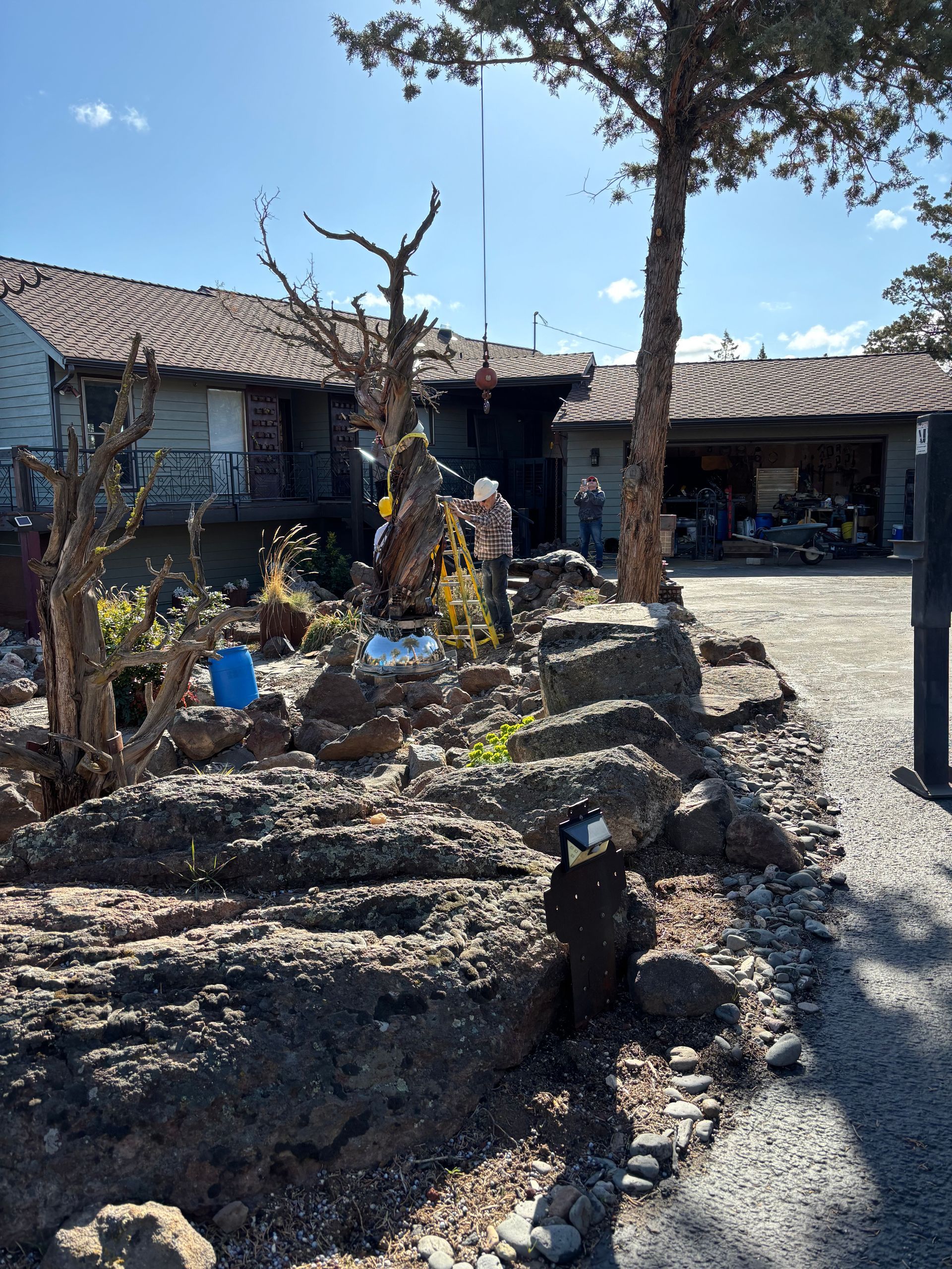 A house with a lot of rocks in front of it