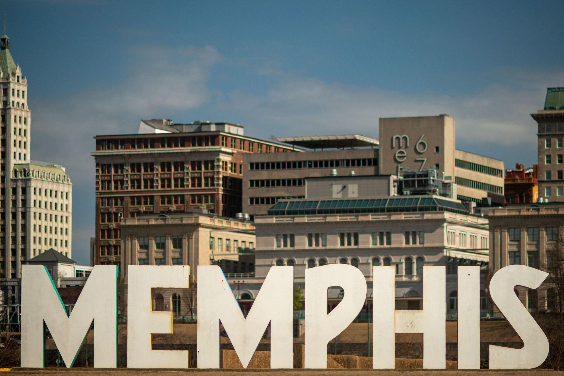 Iconic Memphis sign set against the downtown Memphis Tennessee skyline