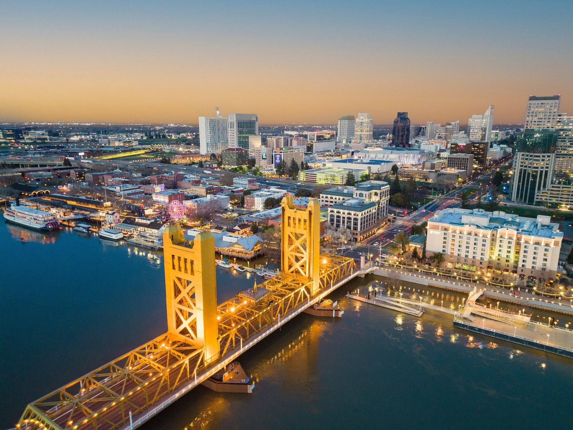 Sunlit Sacramento skyline with modern buildings.